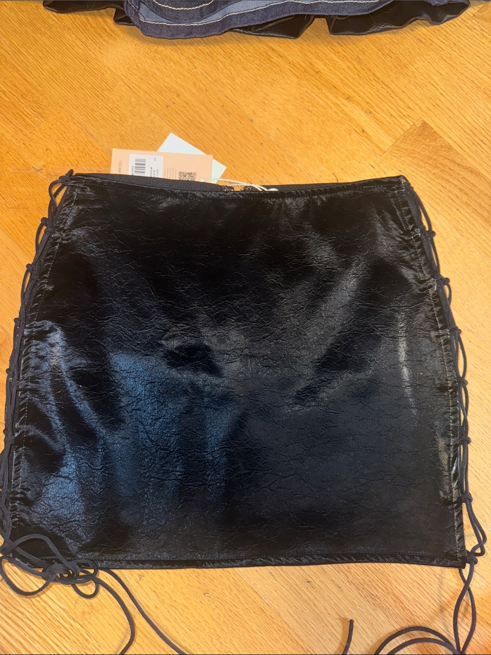 Tiger Mist Black Faux Leather Mini Skirt with Side Lace-Up Detail